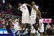 DALLAS, TX - FEBRUARY 8: Crandall Head #13 and Markus Kennedy #5 of the SMU Mustangs celebrate during a timeout against the Cincinnati Bearcats on February 8, 2014 at Moody Coliseum in Dallas, Texas. (Photo by Cooper Neill/Getty Images)