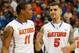 ATLANTA, GA - MARCH 14: Scottie Wilbekin #5 of the Florida Gators reacts with Lexx Edwards #11 after their 72-49 win over the Missouri Tigers during the quarterfinals of the SEC Men's Basketball Tournament at Georgia Dome on March 14, 2014 in Atlanta, Ge