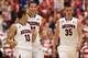 TUCSON, AZ - FEBRUARY 26: (L-R) Nick Johnson #13, Aaron Gordon #11 and Kaleb Tarczewski #35 of the Arizona Wildcats react after scoring against the California Golden Bears during the second half of the college basketball game at McKale Center on February