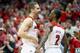 LOUISVILLE, KY - MARCH 08: Luke Hancock #11 and Russ Smith #2 of the Louisville Cardinals celebrates in the final minutes of the game against the Connecticut Huskies at KFC YUM! Center on March 8, 2014 in Louisville, Kentucky. It was senior day and it wa