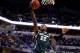 INDIANAPOLIS, IN - MARCH 16: Branden Dawson #22 of the Michigan State Spartans goes to the basket against the Michigan Wolverines during the 2014 Big Ten Men's Championship at Bankers Life Fieldhouse on March 16, 2014 in Indianapolis, Indiana. (Photo by