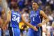 GREENSBORO, NC - MARCH 16: Jabari Parker #1 of the Duke Blue Devils is congratulated by Andre Dawkins #34 of the Duke Blue Devils during their game against the Virginia Cavaliers in the finals of the 2014 Men's ACC Basketball Tournament at Greensboro Col