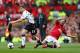 MANCHESTER, ENGLAND - MARCH 16: Jon Flanagan of Liverpool competes with Juan Mata of Manchester United during the Barclays Premier League match between Manchester United and Liverpool at Old Trafford on March 16, 2014 in Manchester, England. (Photo by A