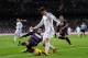 MADRID, SPAIN - NOVEMBER 30: Alvaro Morata (R) of Real Madrid CF is tackled by Marc Valiente of Real Valladolid CF during the La Liga match between Real Madrid CF and Real Valladolid CF at Santiago Bernabeu stadium on November 30, 2013 in Madrid, Spain.
