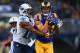 ST. LOUIS, MO - NOVEMBER 3: Cortland Finnegan #31 of the St. Louis Rams intercepts a pass intended for Kenny Britt #18 of the Tennessee Titans at the Edward Jones Dome on November 3, 2013 in St. Louis, Missouri. (Photo by Dilip Vishwanat/Getty Images)