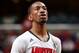 MEMPHIS, TN - MARCH 14: Russ Smith #2 of the Louisville Cardinals shoots a freethrow against the Houston Cougars during the semifinals of the American Athletic Conference Tournament at FedExForum on March 14, 2014 in Memphis, Tennessee. (Photo by Joe Murp