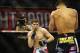 Nov 6, 2013; Fort Campbell, KY, USA; Jorge Masvidal (red gloves) fights Rustam Khabilov (blue gloves) in the lightweight bout during UFC Fight for the Troops at Fort Campbell. Mandatory Credit: Joshua Lindsey-USA TODAY Sports