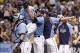 Jul 7, 2013; St. Petersburg, FL, USA; Tampa Bay Rays starting pitcher David Price (14) reacts with pitcher Chris Archer (22) after he threw a complete game against the Chicago White Sox at Tropicana Field. Tampa Bay Rays defeated the Chicago White Sox 3-