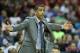 Mar 15, 2014; Memphis, TN, USA; Connecticut Huskies head coach Kevin Ollie gestures from the sidelines during the second half against the Louisville Cardinals in final of the American Athletic Conference college basketball tournament at FedEx Forum. The C