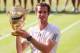 LONDON, ENGLAND - JULY 07: Andy Murray of Great Britain poses with the Gentlemen's Singles Trophy following his victory in the Gentlemen's Singles Final match against Novak Djokovic of Serbia on day thirteen of the Wimbledon Lawn Tennis Championships at