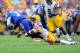 BATON ROUGE, LA - OCTOBER 12: Tyler Murphy #3 of the Florida Gators is sacked by Jalen Mills #28 of the LSU Tigers during a game at Tiger Stadium on October 12, 2013 in Baton Rouge, Louisiana. LSU won the game 17-6. (Photo by Stacy Revere/Getty Images)