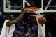 ATLANTA, GA - MARCH 16: Patric Young #4 of the Florida Gators dunks against the Kentucky Wildcats in the seond half during the Championship game of the 2014 Men's SEC Basketball Tournament at Georgia Dome on March 16, 2014 in Atlanta, Georgia. (Photo by