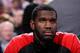 PORTLAND, OR - DECEMBER 01: Greg Oden #52 of the Portland Trail Blazers watches from the sidelines during the game against the Miami Heat on December 1, 2009 at the Rose Garden in Portland, Oregon. The Heat won 107-100. NOTE TO USER: User expressly ack