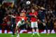 MANCHESTER, ENGLAND - MARCH 19: Ryan Giggs of Manchester United competes with Hernan Perez of Olympiacos during the UEFA Champions League Round of 16 second round match between Manchester United and Olympiacos FC at Old Trafford on March 19, 2014 in Manc