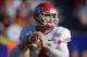 Dec 21, 2013; Las Vegas, NV, USA; Fresno State Bulldogs quarterback Derek Carr (4) throws a pass against the Southern California Trojans in the Las Vegas Bowl at Sam Boyd Stadium. Mandatory Credit: Kirby Lee-USA TODAY Sports