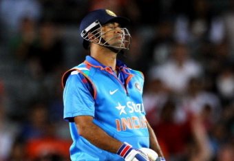 AUCKLAND, NEW ZEALAND - JANUARY 25: MS Dhoni of India reacts after he is dsimissed by Tim Southee of New Zealand during the One Day International match between New Zealand and India at Eden Park on January 25, 2014 in Auckland, New Zealand.  (Photo by Ant