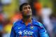 HAMILTON, NEW ZEALAND - JANUARY 22: MS Dhoni of India looks up to the sky as rain falls during the One Day International match between New Zealand and India at Seddon Park on January 22, 2014 in Hamilton, New Zealand. (Photo by Anthony Au-Yeung/Getty Ima
