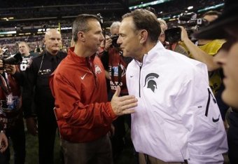 Urban Meyer and Mark Dantonio may go head-to-head for Scott.