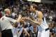 Mar 19, 2014; Dallas, TX, USA; Dallas Mavericks forward Dirk Nowitzki (41) argues a call in the fourth quarter with referee Gary Zielinski (59) against the Minnesota Timberwolves at American Airlines Center. The Timberwolves beat the Mavs 123-122 in overt