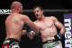 Oct 19, 2013; Houston, TX, USA; Tim Boetsch (red gloves) fights against C.B. Dollaway (blue gloves) in their middleweight bout during UFC 166 at Toyota Center. Mandatory Credit: Andrew Richardson-USA TODAY Sports