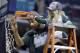 Lacey helps Payne cut down the net after the Big Ten Championship.