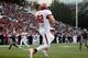 PULLMAN, WA - NOVEMBER 23: Jake Murphy #82 of the Utah Utes scores a touchdown on an 11 yard pass from Adam Schulz #12 during the third quarter of the game against the Washington State Cougars at Martin Stadium on November 23, 2013 in Pullman, Washington
