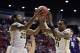 Mar 21, 2014; San Diego, CA, USA; VCU Rams guard Jordan Burgess (20) and guard Treveon Graham (21) control a rebound against Stephen F. Austin Lumberjacks forward Nikola Gajic (4) in the first half of a men's college basketball game during the second roun