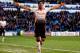 CARDIFF, WALES - MARCH 22: Luis Suarez of Liverpool celebrates after scoring hihs third and his team's sixth goal of the game during the Barclays Premier League match between Cardiff City and Liverpool at Cardiff City Stadium on March 22, 2014 in Cardiff