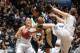 Mar 22, 2014; West Lafayette, IN, USA; Akron Zips guard Anita Brown (15) battles for a rebound against Purdue Boilermakers guard Courtney Moses (15) and forward Whitney Bays (32) during the first half in a women's college basketball game in the first ro