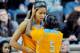 Jan 12, 2014; Nashville, TN, USA; Tennessee Lady Volunteers center Isabelle Harrison (20) after receiving her fifth foul which was ruled a technical is consoled by Tennessee guard Ariel Massengale (5) during the second half against the Vanderbilt Commodor