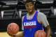 Mar 20, 2014; St. Louis, MO, USA; Kansas Jayhawks guard Andrew Wiggins (22) holds basketballs during their practice session prior to the 2nd round of the 2014 NCAA Men's Basketball Championship at Scottrade Center. Mandatory Credit: Scott Rovak-USA TODAY