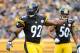 PITTSBURGH, PA - OCTOBER 07: James Harrison #92 of the Pittsburgh Steelers signals a teammate during the game against the Philadelphia Eagles on October 7, 2012 at Heinz Field in Pittsburgh, Pennsylvania. (Photo by Joe Sargent/Getty Images)