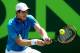 KEY BISCAYNE, FL - MARCH 23: Andy Murray of Great Britain returns a shot to Feliciano Lopez of Spain during the Sony Open at the Crandon Park Tennis Center on March 23, 2014 in Key Biscayne, Florida. (Photo by Matthew Stockman/Getty Images)