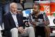 DALLAS, TX - DECEMBER 26: Gregg Popovich and Tony Parker #9 of the San Antonio Spurs talk before the game against the Dallas Mavericks on December 26, 2013 at the American Airlines Center in Dallas, Texas. NOTE TO USER: User expressly acknowledges and ag