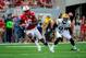 LINCOLN, NE - SEPTEMBER 7: Cornerback Stanley Jean-Baptiste #16 of the Nebraska Cornhuskers intercepts a pass in front of wide receiver Rickey Bradley #81 of the Southern Miss Golden Eagles during their game at Memorial Stadium on September 7, 2013 in Lin