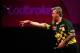 LONDON, ENGLAND - DECEMBER 22: Simon Whitlock of Australia in action during his second round match against Jarkko Komula of Finland during the Ladbrokes.com World Darts Championship on Day Ten at Alexandra Palace on December 22, 2013 in London, England. (