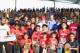KUALA LUMPUR, MALAYSIA - MARCH 24: Laureus Academy Member Tony Hawk poses with Su Ling, CEO of YR1M and skatebaorders as he visits an urban skateboard park ahead of the Laureus World Sports Awards at Kiara Skate Park on March 24, 2014 in Kuala Lumpur, Ma