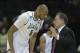 Mar 20, 2014; Spokane, WA, USA; Michigan State Spartans forward Adreian Payne (5) listens to head coach Tom Izzo (right) in the second half of a men's college basketball game during the second round of the 2014 NCAA Tournament against the Delaware Fightin