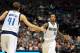 Dec 3, 2013; Dallas, TX, USA; Dallas Mavericks guard Monta Ellis (11) celebrates with forward Dirk Nowitzki (41) after a basket in the fourth quarter against the Charlotte Bobcats at American Airlines Center. The Mavs beat the Bobcats 89-82. Mandatory Cr