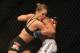 ANAHEIM, CA - FEBRUARY 23: Ronda Rousey pins Liz Carmouche up against the fence in their UFC Bantamweight Title fight during UFC 157 at Honda Center on February 23, 2013 in Anaheim, California. (Photo by Jeff Gross/Getty Images)