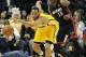 Mar 26, 2014; Indianapolis, IN, USA; Indiana Pacers forward Evan Turner (12) and Miami Heat guard Mario Chalmers (15) go after a loose ball during the second quarter at Bankers Life Fieldhouse. Mandatory Credit: Pat Lovell-USA TODAY Sports