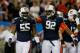 Carl Lawson (left) will be the leader at DE this spring.