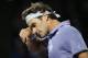 KEY BISCAYNE, FL - MARCH 26: Roger Federer of Switzerland shows his dejection against Kei Nishikori of Japan during their quarter final round match during day 10 at the Sony Open at Crandon Park Tennis Center on March 26, 2014 in Key Biscayne, Florida.