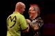 Michael van Gerwen's win over closest rival Peter Wright takes him clear at the top of the table.