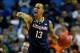 BUFFALO, NY - MARCH 22: Shabazz Napier #13 of the Connecticut Huskies calls a play against the Villanova Wildcats during the third round of the 2014 NCAA Men's Basketball Tournament at the First Niagara Center on March 22, 2014 in Buffalo, New York. (Pho