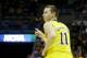 MILWAUKEE, WI - MARCH 20: Nik Stauskas #11 of the Michigan Wolverines celebrates a three point shot in the second half during the second round of the 2014 NCAA Men's Basketball Tournament at BMO Harris Bradley Center on March 20, 2014 in Milwaukee, Wisco