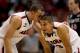 ANAHEIM, CA - MARCH 27: Gabe York #1 talks with Nick Johnson #13 of the Arizona Wildcats in the second half while taking on the San Diego State Aztecs during the regional semifinal of the 2014 NCAA Men's Basketball Tournament at the Honda Center on March