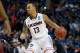 Mar 20, 2014; Buffalo, NY, USA; Connecticut Huskies guard Shabazz Napier (13) during a men's college basketball game against the Saint Joseph's Hawks during the second round of the 2014 NCAA Tournament at First Niagara Center. Mandatory Credit: Kevin Hoff