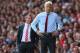 LIVERPOOL, ENGLAND - SEPTEMBER 02: Arsene Wenger the manager of Arsenal and Brendan Rodgers the manager of Liverpool look on during the Barclays Premier League match between Liverpool and Arsenal at Anfield on September 2, 2012 in Liverpool, England. (