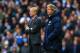 MANCHESTER, ENGLAND - DECEMBER 14: Arsene Wenger manager of Arsenal and Manuel Pellegrini manager of Manchester City look on during the Barclays Premier League match between Manchester City and Arsenal at Etihad Stadium on December 14, 2013 in Manchester